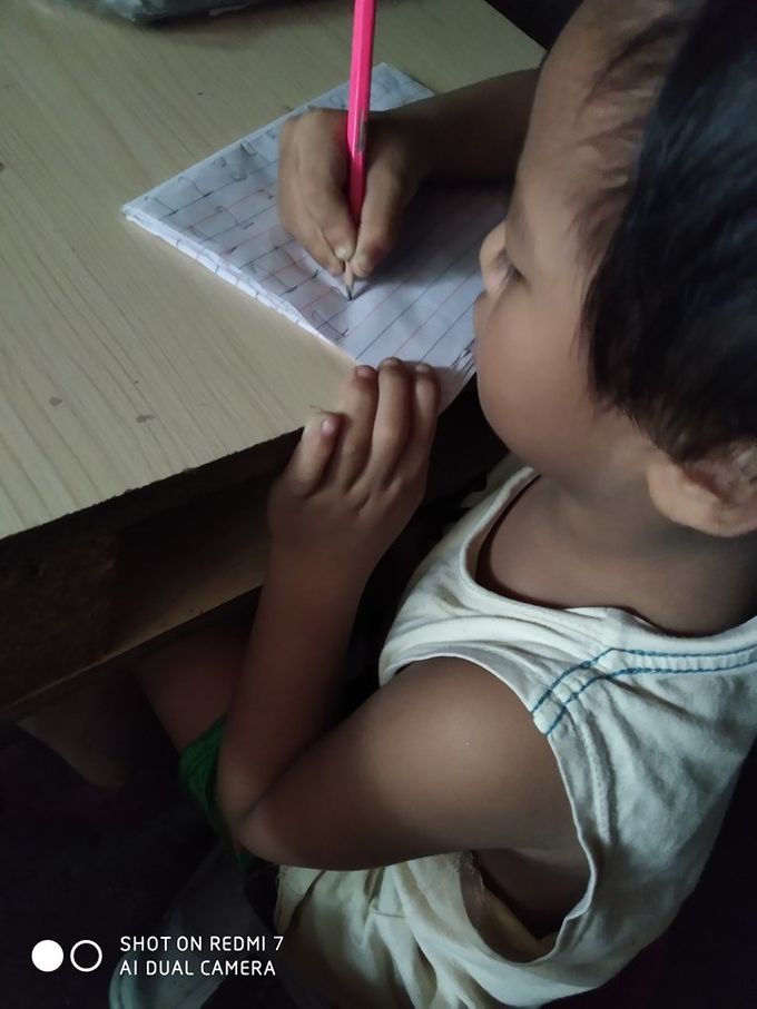 Jane's photo: Aaron working on his numbers.
