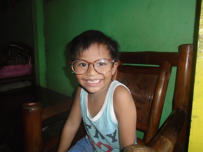 Aaron tries on my reading glasses..