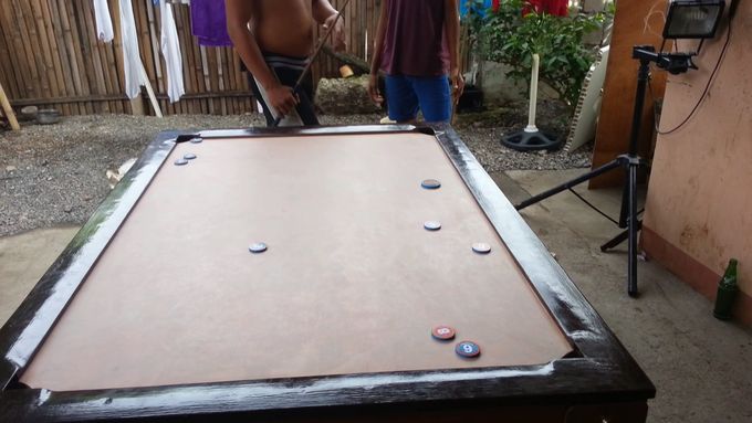 A Philippine street pool table. (arnel insecto)