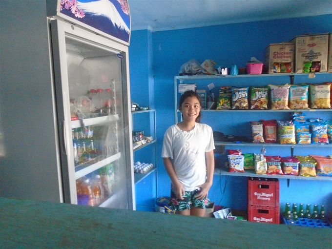 Donaiza's main responsibility: manning the Raguindin family's sari-sari shop.